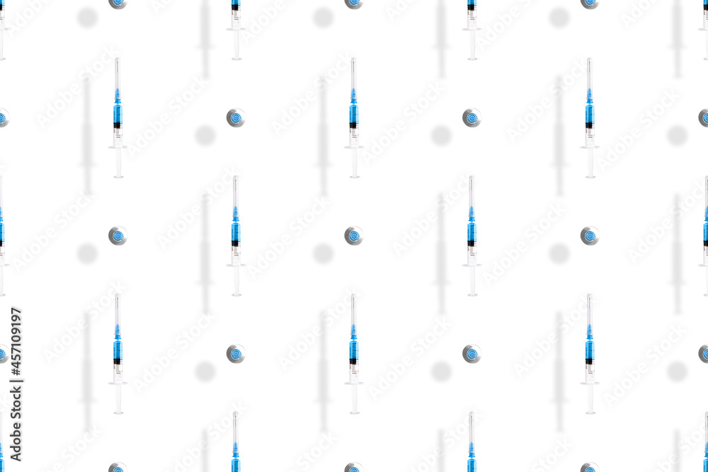 Medical syringes seamless pattern. Background on the theme of medicine, vaccination and human health. Medical syringes seamless pattern. Background on the theme of medicine, vaccination and human health.