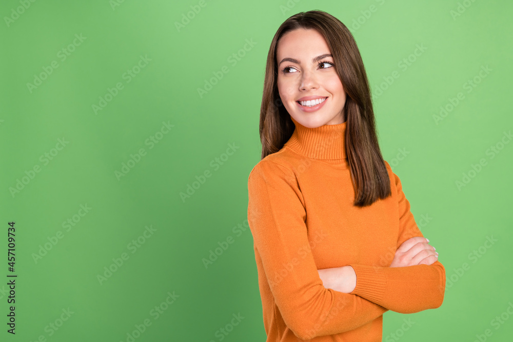 Photo portrait business woman smiling folded hands casual clothes looking empty space isolated pastel green color background Photo portrait business woman smiling folded hands casual clothes looking empty space isolated pastel green color background