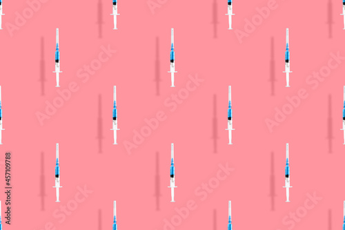 Medical syringes seamless pattern. Background on the theme of medicine, vaccination and human health.