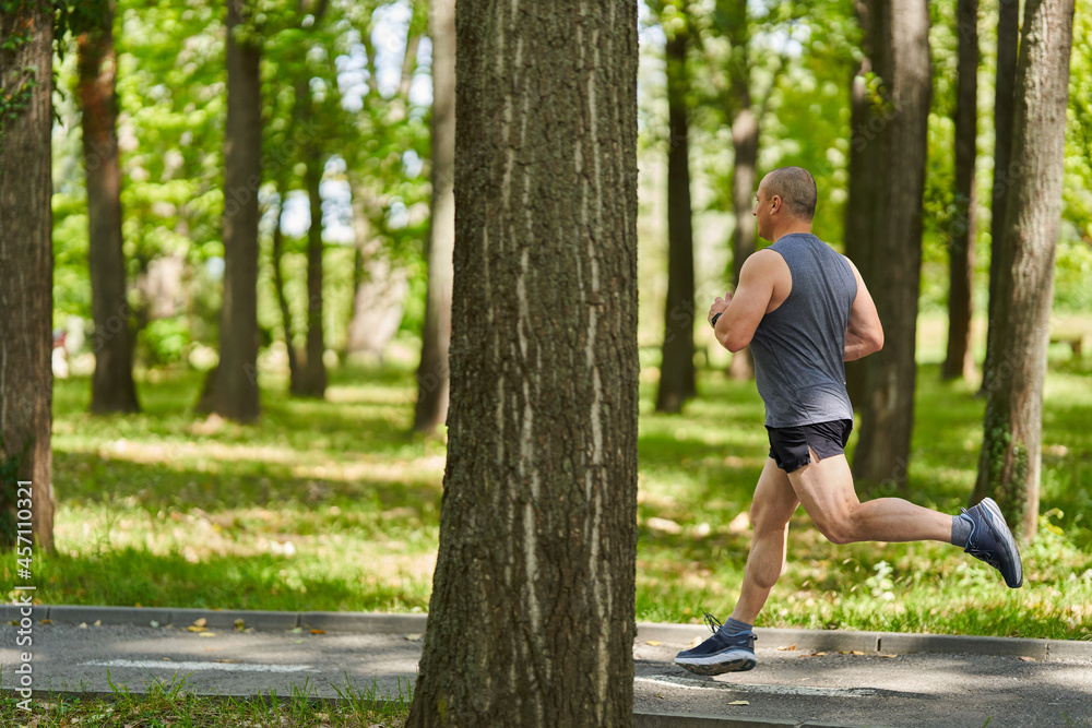 Long distance runner training in the park