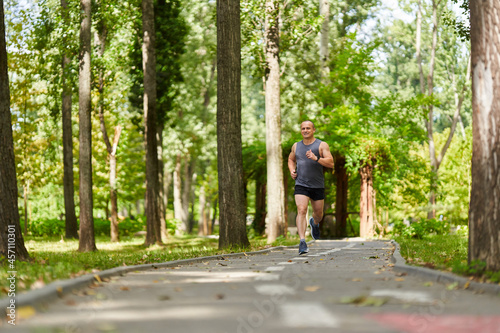 Long distance runner training in the park