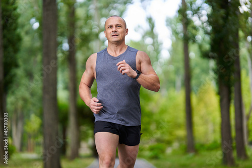 Long distance runner training in the park