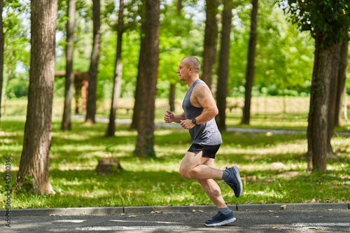 Long distance runner training in the park