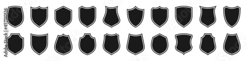 Set of various vintage shield icons. Black outlined heraldic shields. Protection and security symbol, label. Vector illustration.