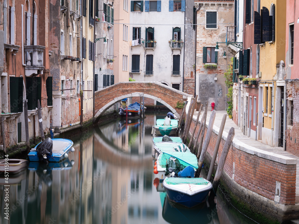 Traditional bridge over a small canal at Cannaregio, Venice - Italy