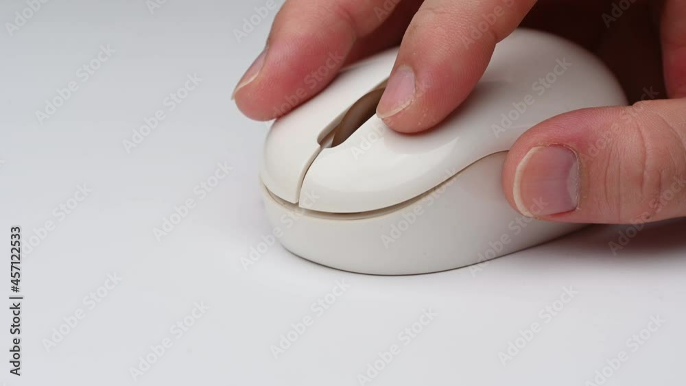 Clicking digital wireless mouse and working on computer at the office. Close up hand on mouse. The concept of using technology for rapid success. Computer lab. Cyber business.4k Clicking digital wireless mouse and working on computer at the office. Close up hand on mouse. The concept of using technology for rapid success. Computer lab. Cyber business.4k