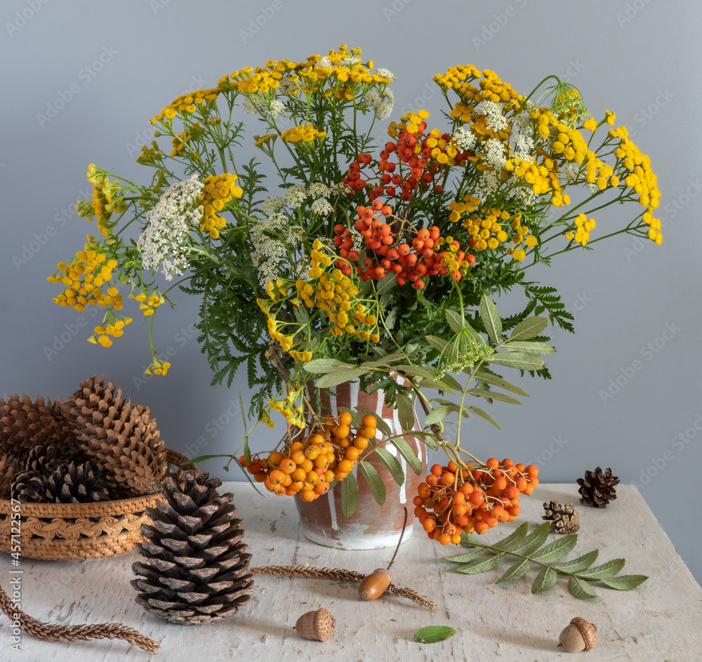 custom made wallpaper toronto digitalA bouquet of meadow flowers and rowan branches with red bunches of berries. There are cones in a wicker basket.