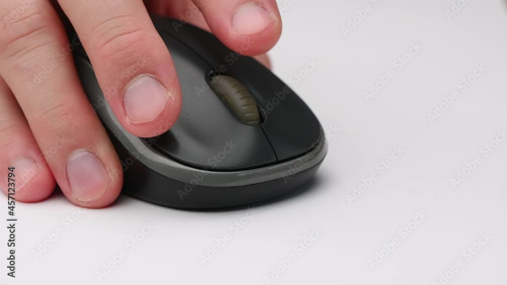 Clicking digital wireless mouse and working on computer at the office. Close up hand on mouse. The concept of using technology for rapid success. Computer lab. Cyber business.4k Clicking digital wireless mouse and working on computer at the office. Close up hand on mouse. The concept of using technology for rapid success. Computer lab. Cyber business.4k