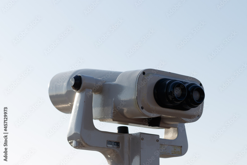 Tourist binoculars. Binoculars telescope on observation deck for tourist. 
Observatory telescope. Observation Binoculars.