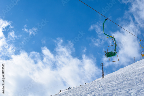 Mount Elbrus with ski slopes. Caucasus snowy mountains. Alpine skiing in the fresh air.