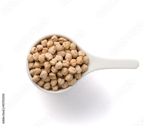 white cup full of chickpea isolated on white. Top view