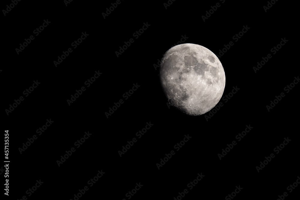 waxing gibbous moon in the night sky waxing gibbous moon in the night sky