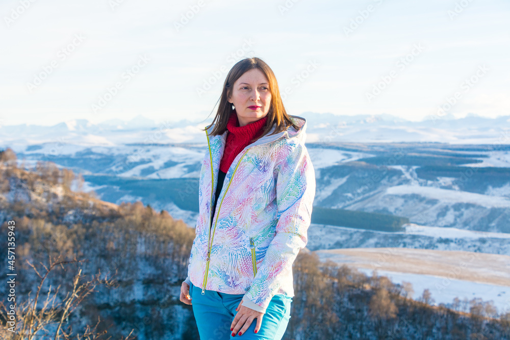 Kislovodsk, Russia. December 28, 2018. Portrait of a beautiful woman of 30 years in the mountains in winter