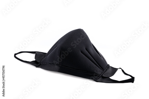Black cloth mask for protection dust or disease covid-19 isolated on white background..