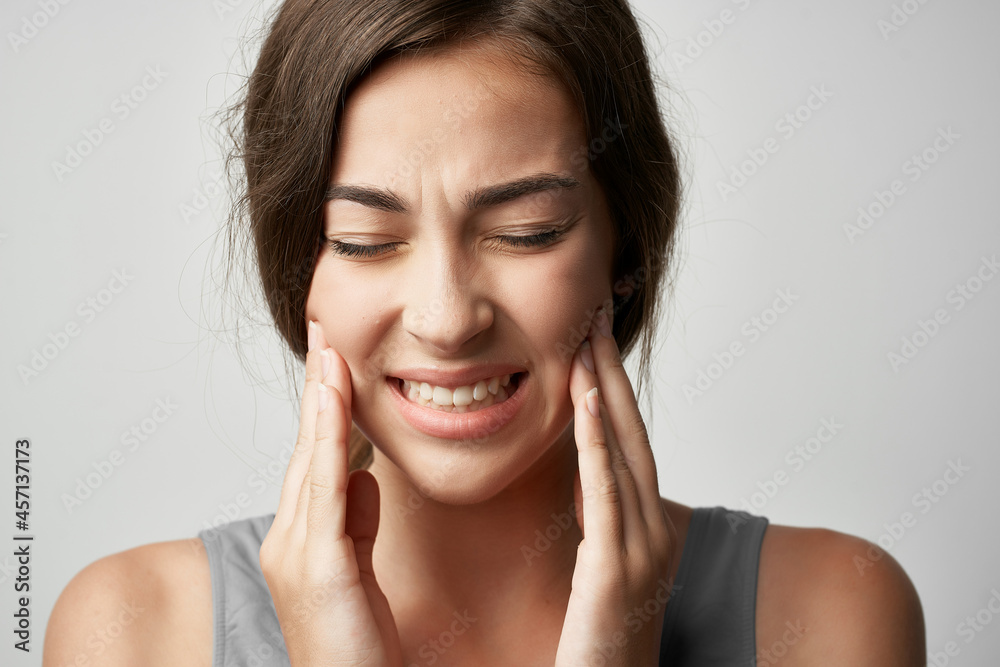 woman in t shirt health problems migraine pain close-up woman in t shirt health problems migraine pain close-up