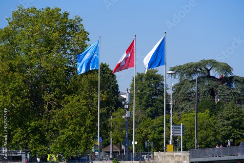 Blue flag of Diamond League Meeting Weltklasse Zürich with Swiss flag and flag of City and Canton Zürich on a sunny late summer day. Photo taken September 6th, 2021, Zurich, Switzerland.