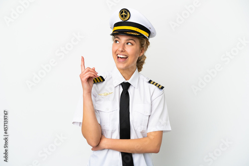 Airplane blonde woman pilot isolated on white background pointing up a great ide Fototapet