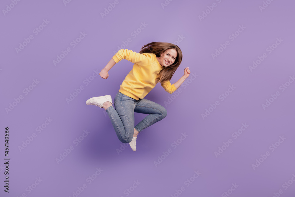 Profile portrait of cheerful crazy active lady jump run hurry sale season on purple background