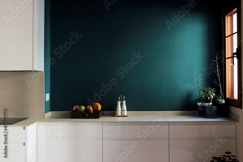 modern kitchen green wall with milk fruit and good lighting
