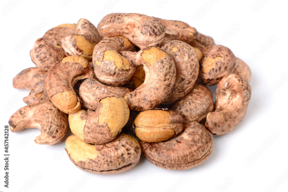 roasted cashew nuts with peel isolated on the white background