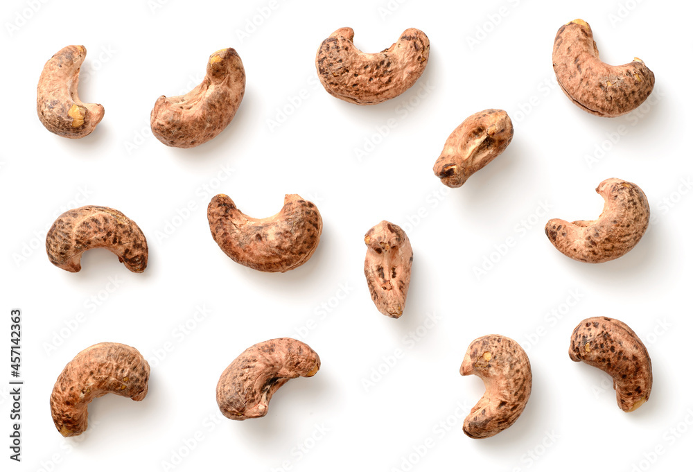 roasted cashew nuts with peel isolated on the white background, top view roasted cashew nuts with peel isolated on the white background, top view