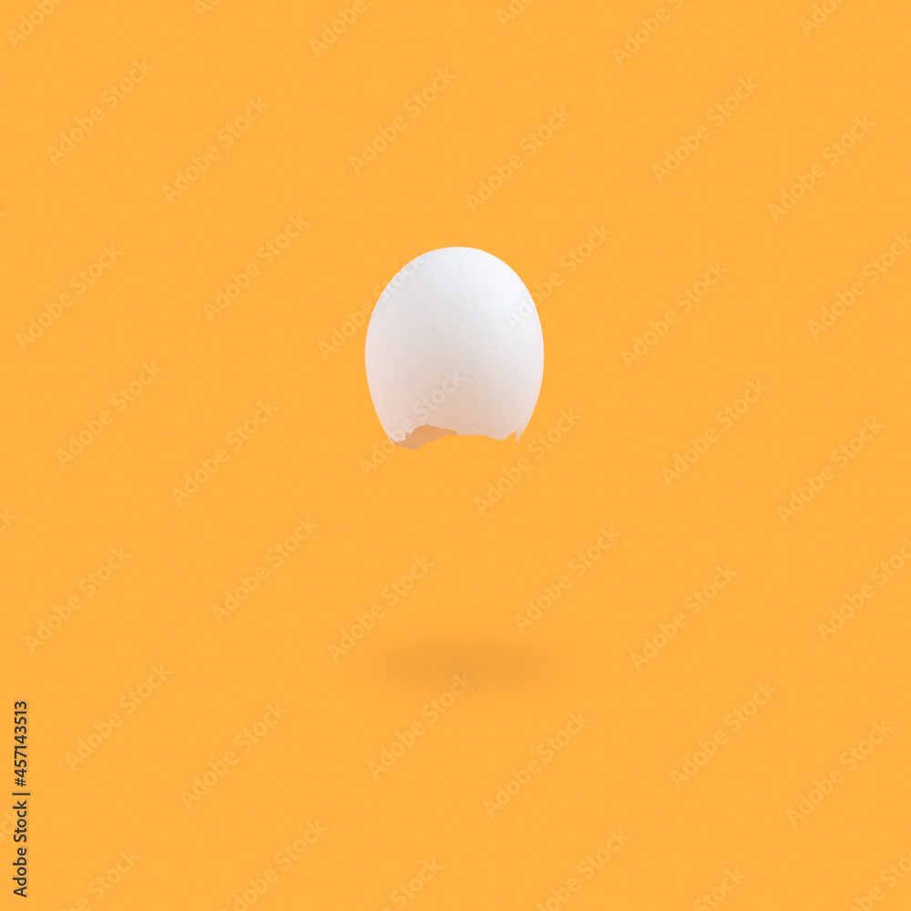 Simple Halloween concept with flying eggshell as ghost character