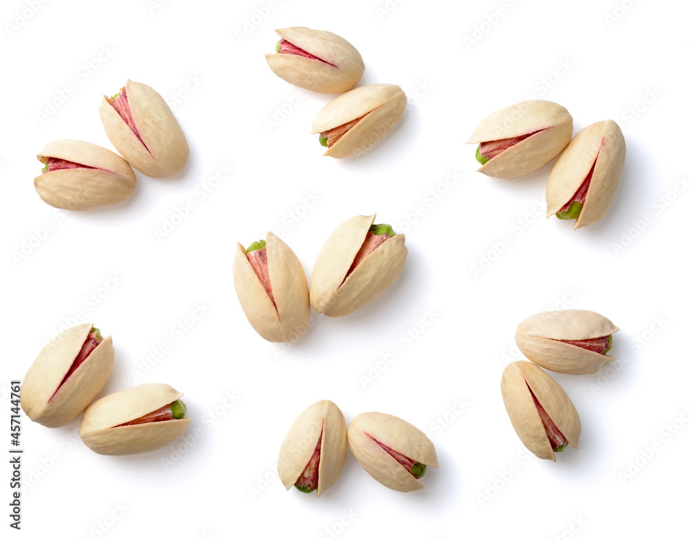 pistachios with shell isolated on white background, top view pistachios with shell isolated on white background, top view
