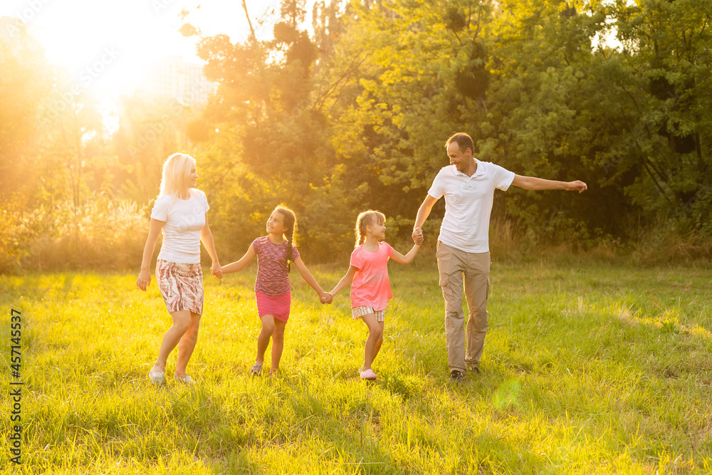 Fototapeta premium Happy family together bonding outdoors