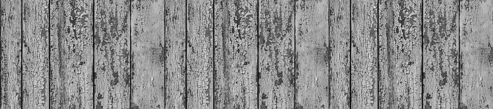 Fototapeta premium Wooden planks background. Black and white panoramic wood texture.