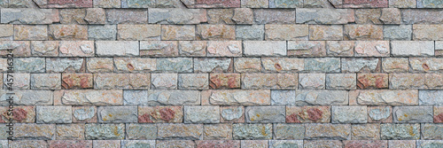 Quartzite stone wall panoramic background. Gray seamless quartz rock texture