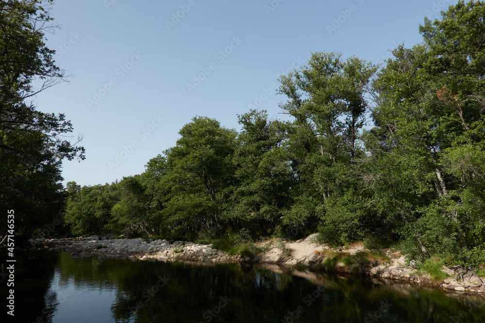 The river of La Garganta de los Caballeros in the Sierra de Gredos. Castile and Leon. Avila. Spain The river of La Garganta de los Caballeros in the Sierra de Gredos. Castile and Leon. Avila. Spain
