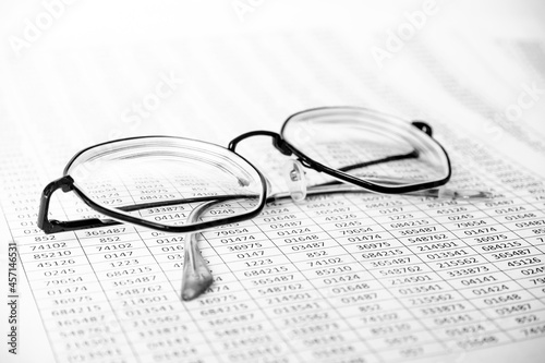Financial Image Of Some Tax Forms With Glasses. Business concept. Accounting report  estimate.