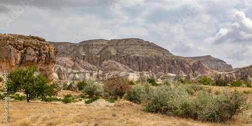 Cappadocia, Turkey - September 1, 2021 – Impressive ancient cave home which had been carved in the Vulcanic rock cliff face of Pigeon Valley at Uchisar in the Cappadocia region of Turkey.