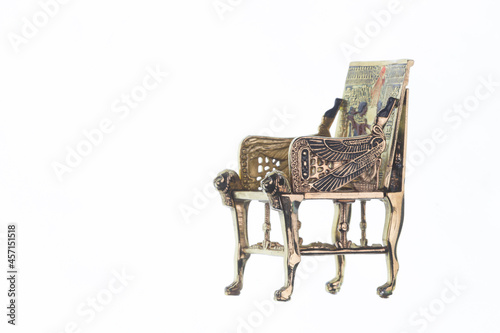 golden throne isolated on white background, egyptian pharaoh throne photo