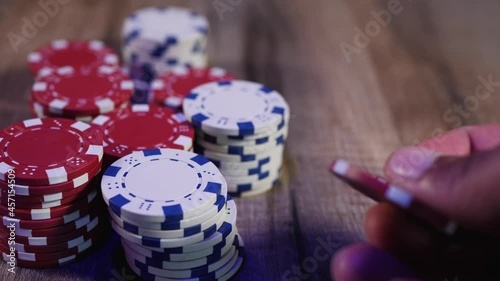 Man playing with poker chips