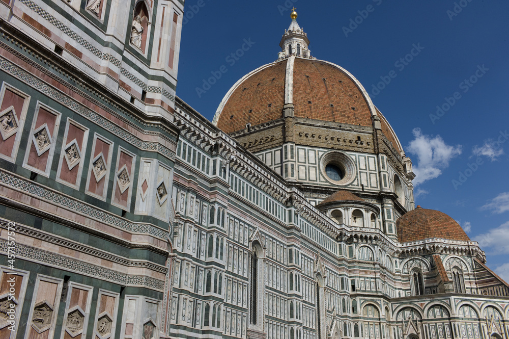 View on the monumental Dome of Santa Maria del Fiore church in Florence, Italy. Blue sky