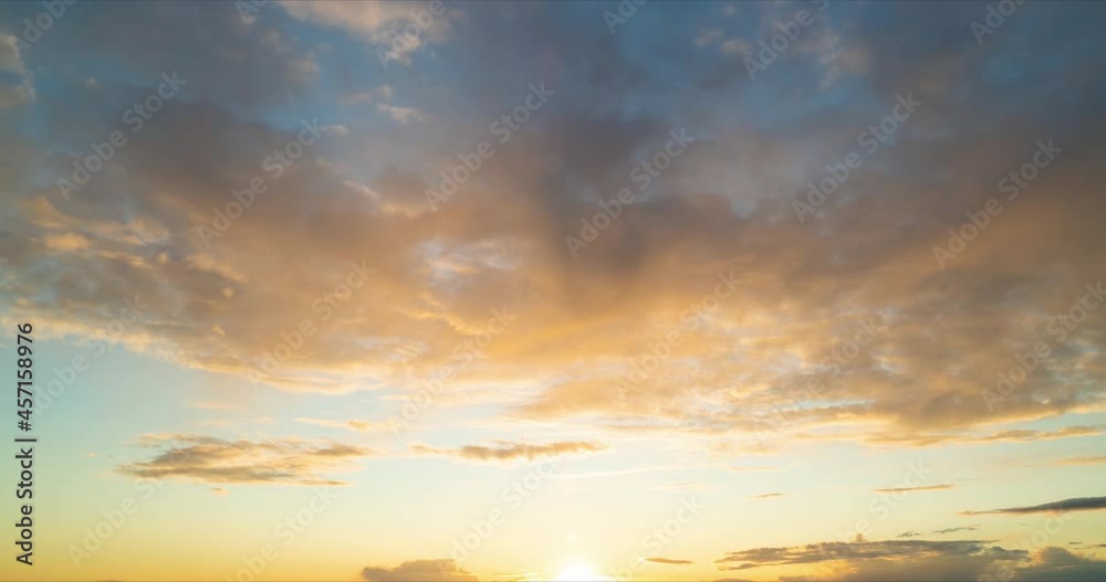 Clouds fly across the sky at sunset. Timelapse Clouds fly across the sky at sunset. Timelapse