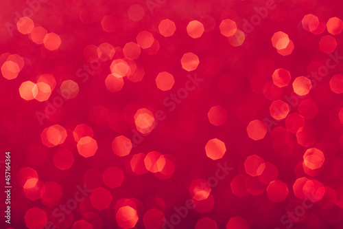 Red glowing sequins blurred background