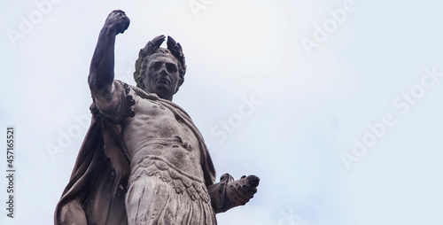 Antique statue of Roman dictator, politician, historian and military  general Gaius Julius Caesar. Copy space. photo