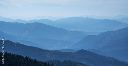 Fototapeta Naklejka Na Ścianę i Meble -  High peaks of beautiful dark blue mountain range landscape