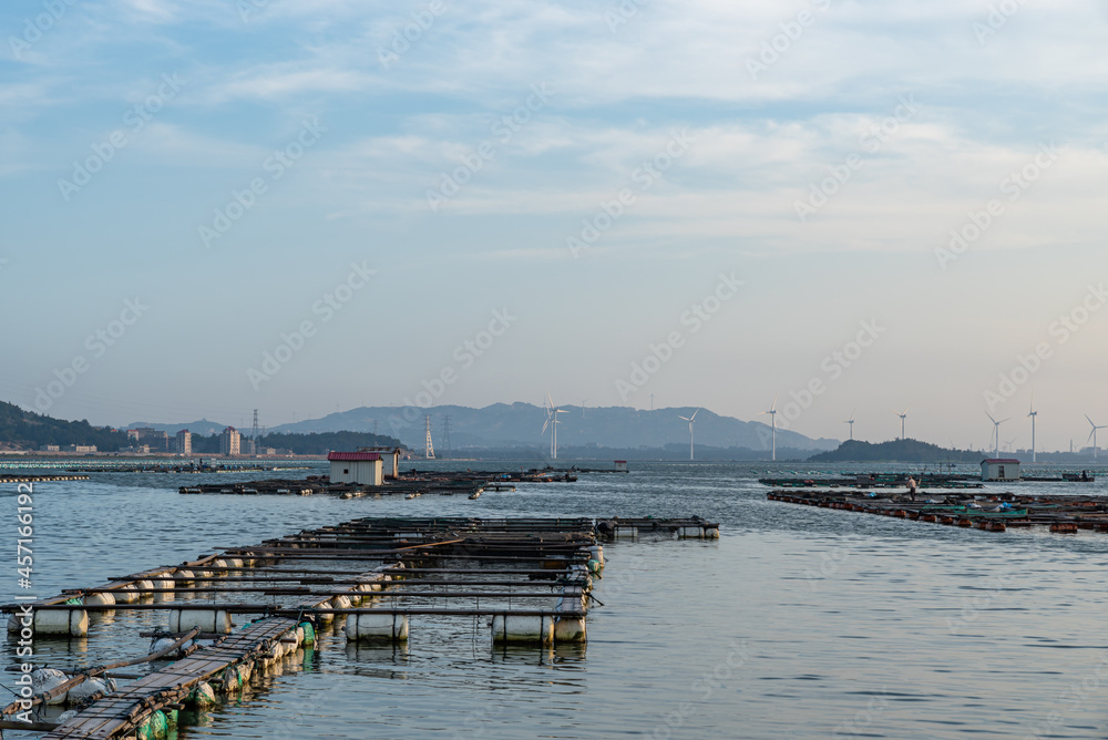 Fishery farms under the blue sky and on the blue sky