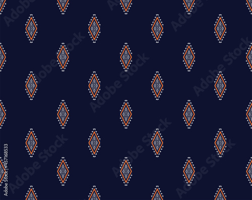 seamless Geometric ethnic texture embroidery design with Dark Blue background design, skirt,wallpaper,clothing,wrapping,Batik,fabric,sheet, orange triangle shapes Vector, illustration design.eps
