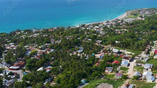 Luperon is a city by the sea in the western part of the Dominican Republic. Narrow streets and slums of the city on the shores of the Caribbean Sea. photo