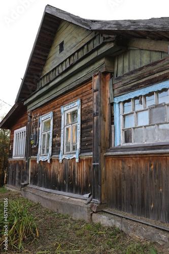 Old village house in autumn in the village © Andrey