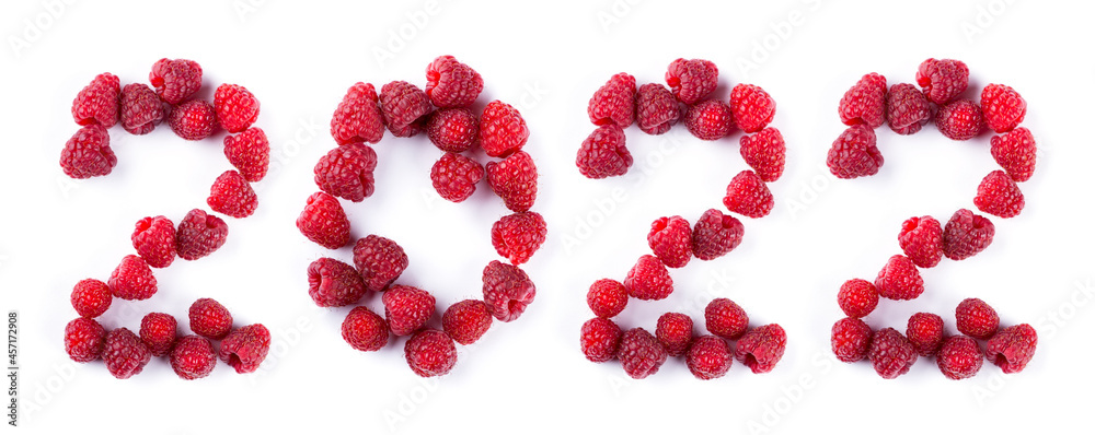 New year 2022 made of raspberries on the white background. Healthy food New year 2022 made of raspberries on the white background. Healthy food