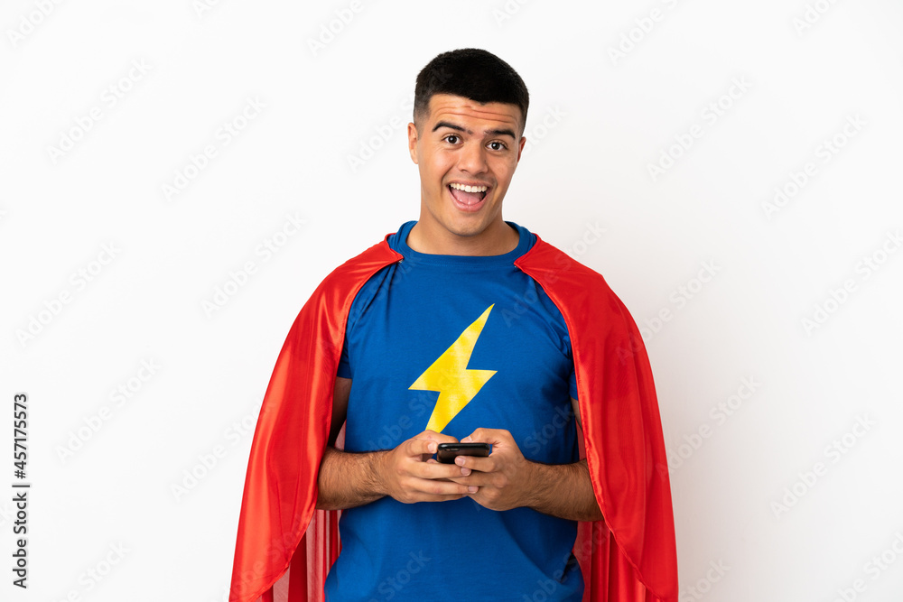 Super Hero over isolated white background surprised and sending a message