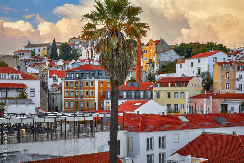 Lisbon panorama of sunset. Portugal. Evening picturesque at houses historic old town in district Alfama.