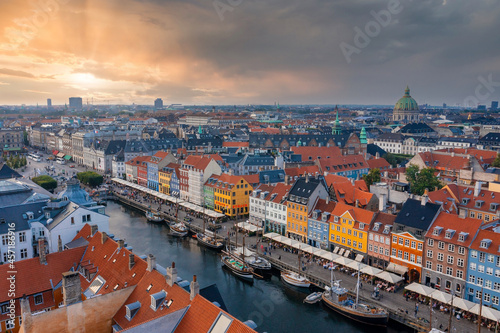 Aerial view of famous Nyhavn pier with colorful buildings and boats in Copenhagen, Denmark. The most popular place in Copenhagen.