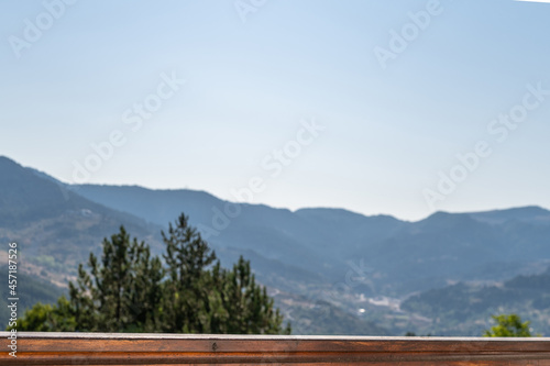 Wooden balcony railing in the mountains