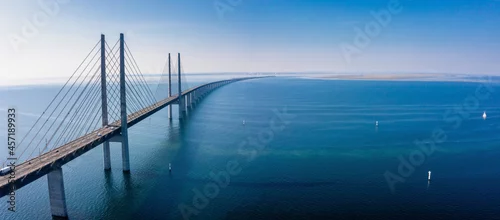 Obraz  z motywem Panoramic aerial view of the Oresundsbron bridge between Denmark and Sweden. Oresund Bridge view at sunset.
